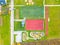 School sports ground with football stadium, jogging tracks around. basketball, volleyball, tennis courts. aerial photo, top view