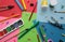 School stationery things lie on a colorful bright background