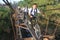 School students go to school through the suspension bridge