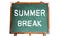 School Summer Break text message in white chalk written on a school green old grungy vintage wooden chalkboard or blackboard