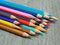 School supplies color pencils shavings on wooden table