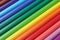 School supplies colored pencils forming a background