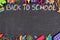 School supplies double border with Back To School written in colorful chalk
