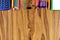 School supplies top border on wood desk background