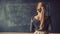 School teacher and lecturer near chalkboard blackboard