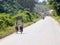 School teenagers biking with friends back home in a rural village