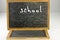 School written on chalkboard. White background