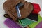 Schoolbag with various supplies on white background