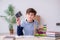 Schoolboy with abacus studying math at home