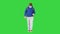 Schoolboy with backpack wearing medical mask walking on a Green Screen, Chroma Key.