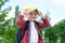 A schoolboy with a book on his head is like a roof on the street on the way to school