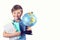A schoolboy boy holding textbooks and a globe isolated on a white background