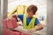 Schoolboy building with toy bricks at a science centre