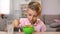 Schoolboy eating cornflakes with milk for breakfast, healthy nutrition, dieting