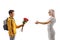 Schoolboy giving a bunch of red roses to a woman