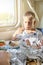 Schoolboy have lunch eating fried chicken in train car