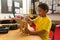 schoolboy learning mathematics with abacus in a classroom