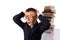 Schoolboy screaming near the huge stack of books