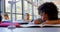 Schoolboy studying at desk in classroom 4k