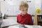 Schoolboy Studying Using a Laptop