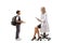 Schoolboy talking to a young female doctor seated on a chair