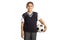 Schoolboy wearing a school uniform and holding a football