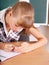 Schoolchild near blackboard.