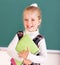 Schoolchild near blackboard.