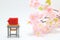 Schoolchild`s rucksacks and cherry blossoms on white background. Red randoseru.