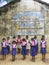 Schoolchildren hoisting their Textbook Festival, marking the distribution of new free textbooks among school students