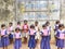 Schoolchildren hoisting their Textbook Festival, marking the distribution of new free textbooks among school students