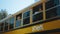 Schoolchildren looking out bus window in morning. students standing in schoolbus