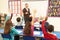 Schoolchildren Studying In Classroom With Teacher