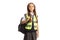 Schoolgirl with a backpack wearing a reflective safety vest