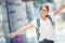 Schoolgirl with bag, backpack. Portrait of modern happy teen school girl with bag backpack. Girl with dental braces and glasses