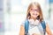 Schoolgirl with bag, backpack. Portrait of modern happy teen school girl with bag backpack headphones and tablet.