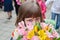 Schoolgirl with bouquet of flowers