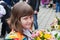 Schoolgirl with bouquet of flowers