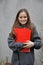 Schoolgirl with exercise books and folders