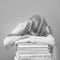 Schoolgirl fell asleep on stack of books. Concept of learning fatigue. Black and white