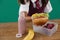 Schoolgirl having sandwich