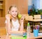 Schoolgirl holding an apple and fast food