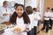 Schoolgirl in a school cafeteria