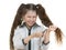 Schoolgirl scissors cuts her hair