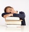 Schoolgirl sleeping on her books