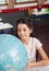 Schoolgirl Smiling While Searching Places On Globe