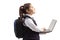 Schoolgirl in a uniform using a laptop computer and looking up