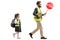 Schoolgirl walking in a safety vest and a man holding a stop traffic sign