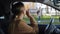 Schoolgirl waving goodbye to mother before school