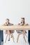 schoolgirls eating cereals for breakfast together